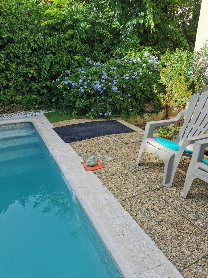 APPARTEMENT EN SOUS SOL DE VILLA avec accès jardin et piscine Marseille Extérieur photo